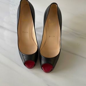Christian Louboutin open toe 5 inch pumps. Size 38. Excellent condition.
